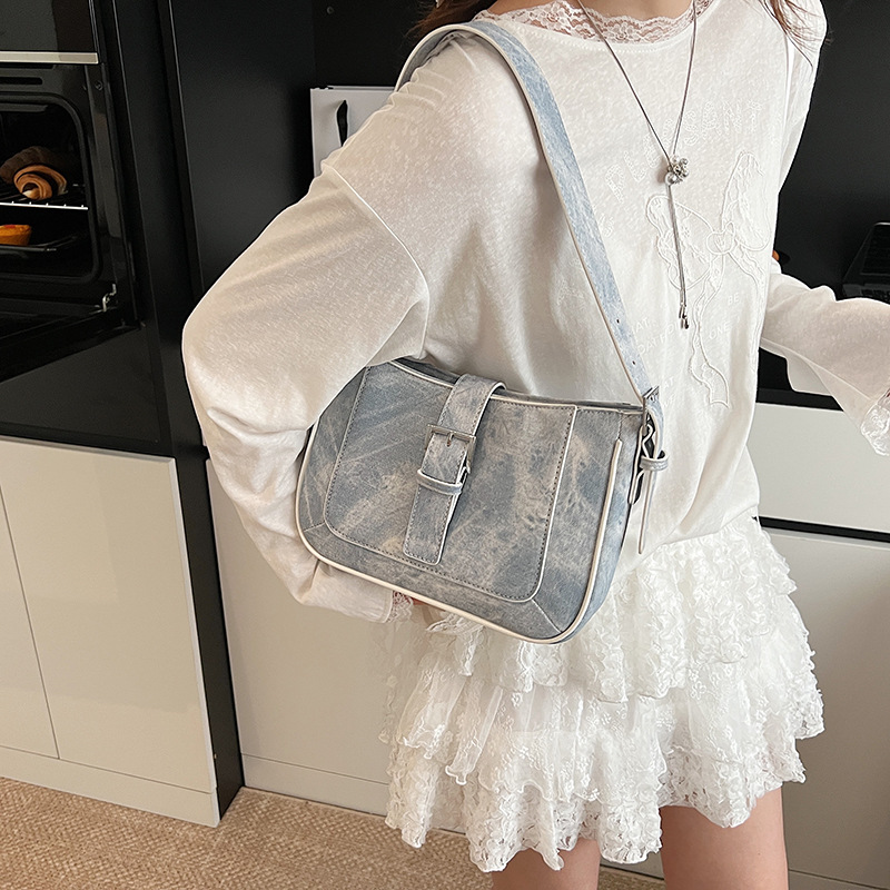 Bolso de axila retro estilo Hong Kong 2025 verano nuevo bolso femenino de alta calidad textura bolso de hombro de todo fósforo de viaje marea