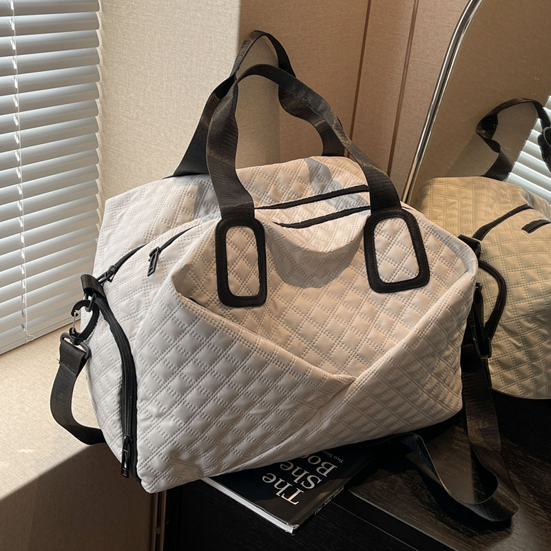 Bolso de mujer 2025 nuevo equipaje de viaje de gran capacidad, bolso de vacaciones de corta distancia de alta calidad.