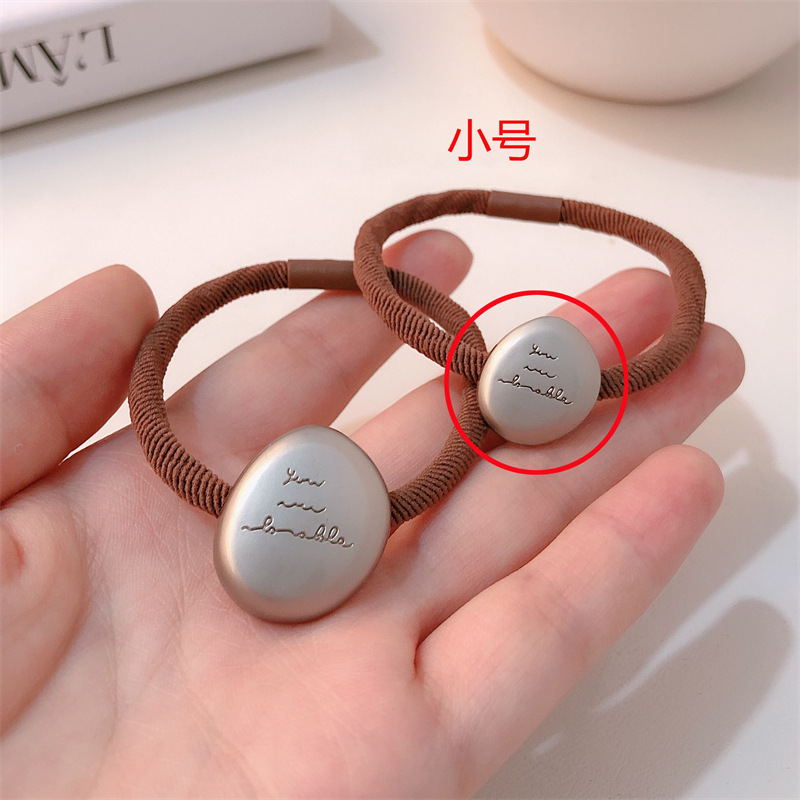 Estrellas metálicas irregulares anillo de cabello temperamento joven de alta elástica cola de caballo cuerda simple banda de goma adornos de cabello