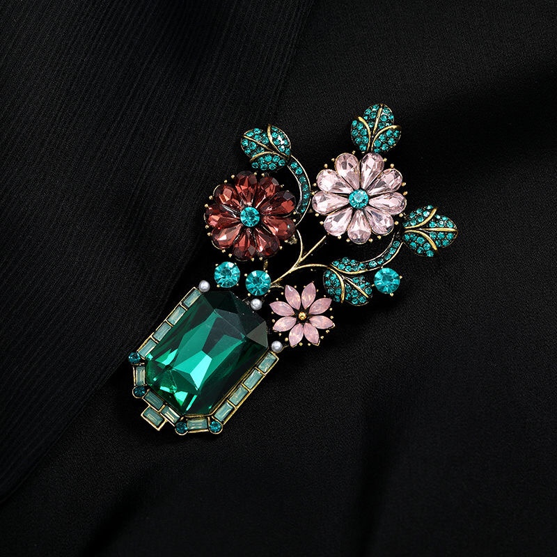 Spilla vintage floreale cristallo verde rame stile corte gioielli_voghion.com