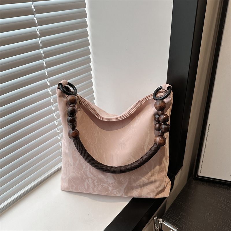 Nuevo estilo chino diseño de bolso de hombro mujer 2024 verano nuevo estilo de moda gran capacidad alta sensación de mochila