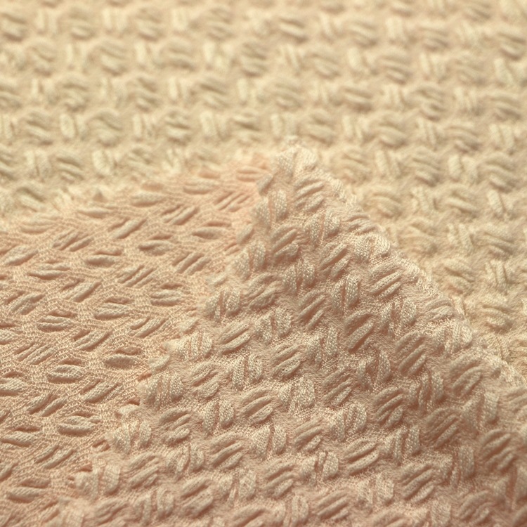 提花咖啡豆单面布汗布服装面料针织纬编全涤氨纶起皱泡泡单面布料