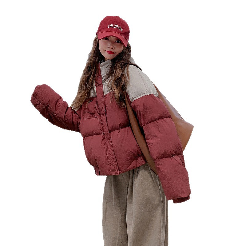 2025 nuevo invierno nuevo algodón mujer corto encapuchado empalme de color contraste grueso chaqueta suelta moda