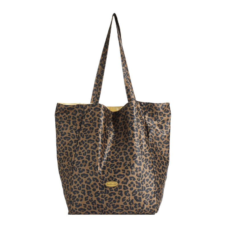 2024 nuevos productos ins perezoso mochila de gran capacidad de moda leopardo retrógrado simple clase mochila de viaje ligera