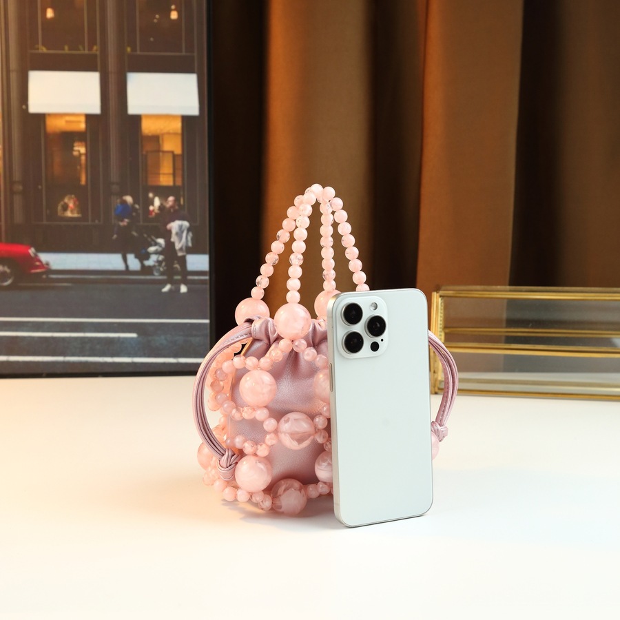 Nuova borsa da donna con design a nicchia in metallo traforato, borsa a secchiello alla moda per feste serali, stile popolare_voghion.com
