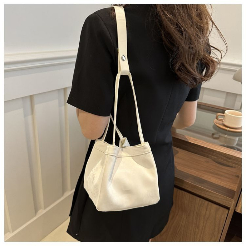 올해 인기있는 작은 가방 작은 디자인 한국 핑크 야채 바구니 가방 여성을위한 새로운 중국 스타일 올 매치 슬렁 버킷 가방