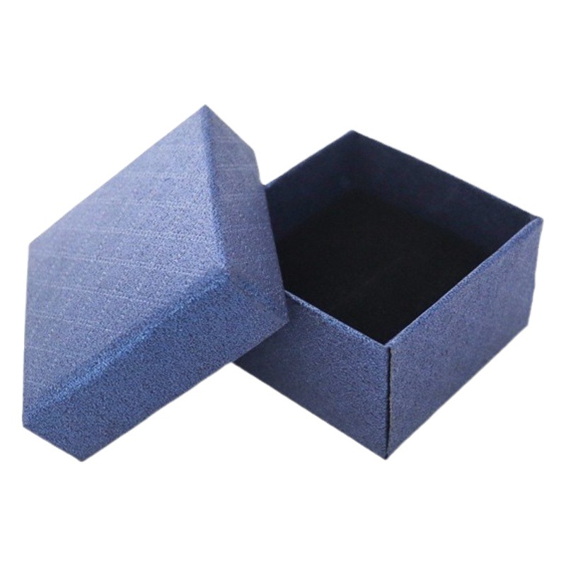 Nueva caja de papel pequeña de margarita, joyería de franela de alta gama, joyería, anillo, pendientes, caja de embalaje universal al por mayor