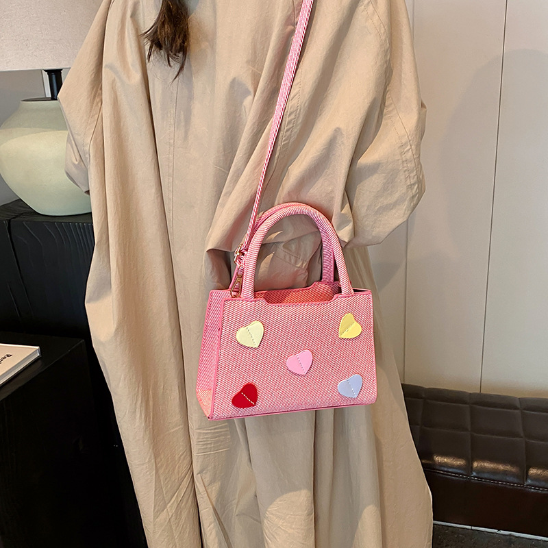 Este año, la popular explosión de bolsos para mujeres 2024 nueva moda versátil bolsos de mochila súper caliente bolsos portátiles de trabajo