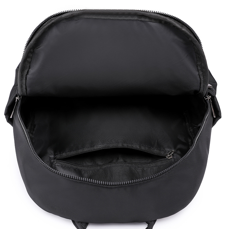 Transfronterizo al por mayor 2023 nueva mochila de nailon para mujer coreana simple y versátil mochila de viaje anti-salpicaduras de agua mochila escolar