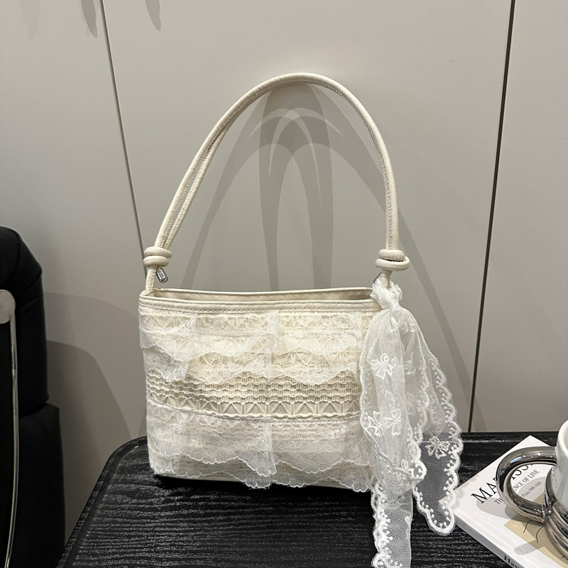 Bolso de mujer 2025 nuevo estilo casual dulce moda coreana estilo occidental textura salvaje bolso de cubo de un solo hombro mujer de alto valor