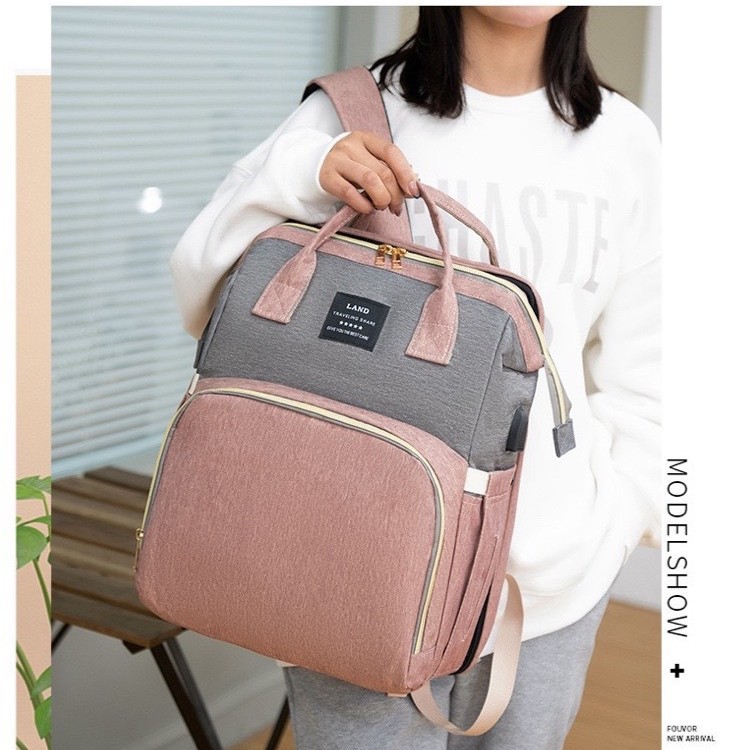 Nuevo japonés y coreano transfronterizo bolso de la momia mochila cuna mochila de gran capacidad hacia fuera bolsa de leche materna y bolsa infantil fábrica