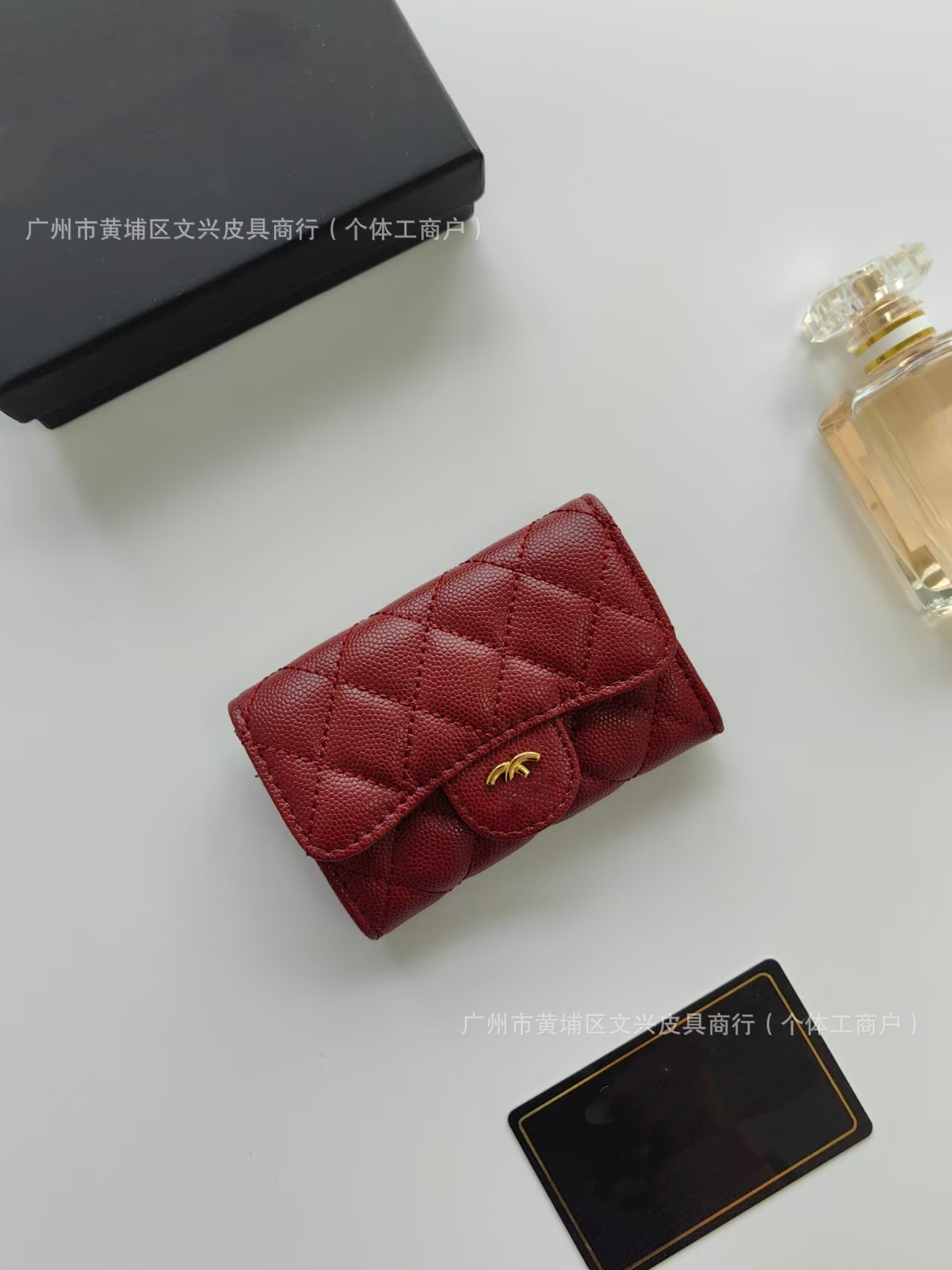 Cartera de cuero corta de diamante de alta calidad, nicho casual, gran capacidad, exquisita, pequeña bolsa de cambio de hebilla fragante.