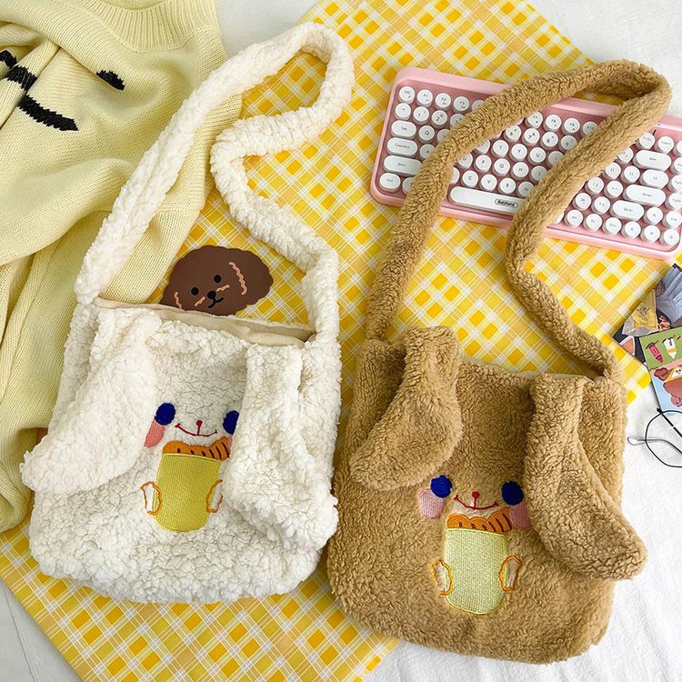 This autumn and winter hand-held bag with big ears, cute animal-embroidered fur, and a simple lambskin large-capacity student backpack undefined