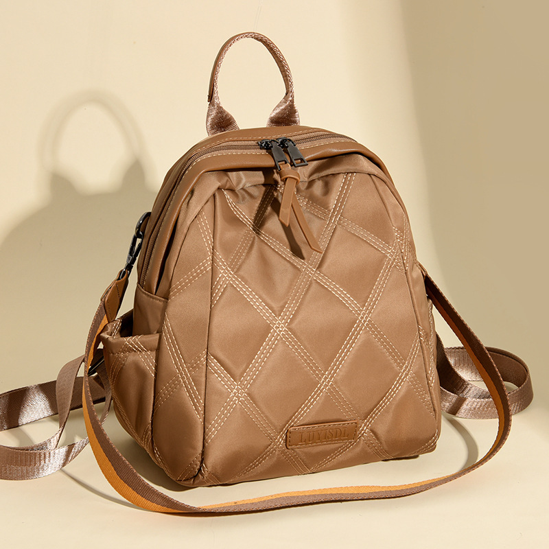 Mochila de moda coreana popular de mujer, bolsas de mujer de color sólido simple, nueva moda de comercio exterior, mochila de viaje.