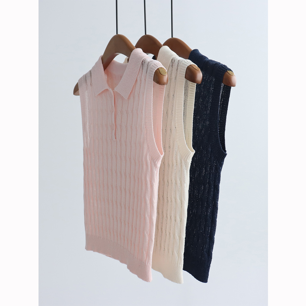 Elegant knitted summer sweater sleevless
