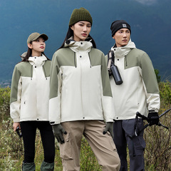 秋冬の新型の色合わせの厚い突撃服の男女のアウトドア登山服の防風防水風衣のコートの印字ロゴ