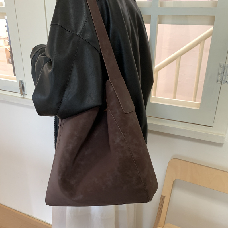 Cross-border 2025 otoño y invierno nuevo retro bolso de braza alta sensación de viaje de gran capacidad bolso de cubo de viaje de mujer bolso de hombro