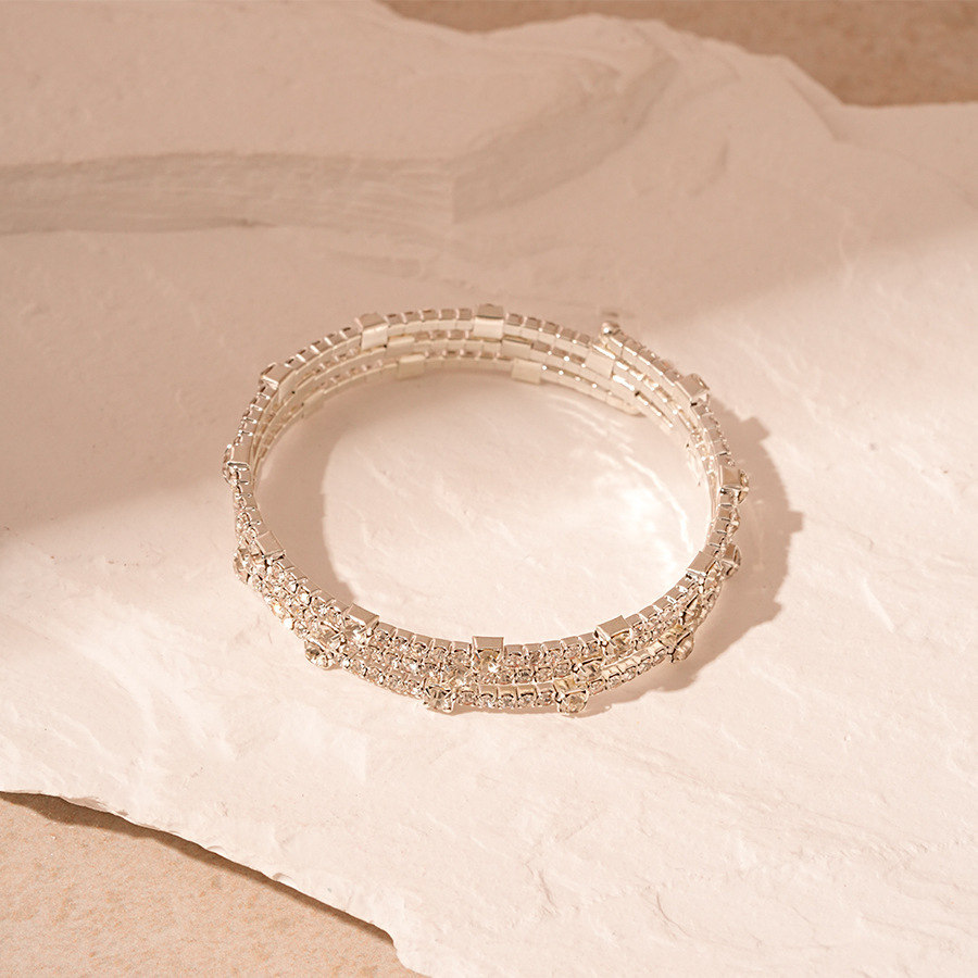 40# open bracelet - silver - 3 circles of large and small diamonds