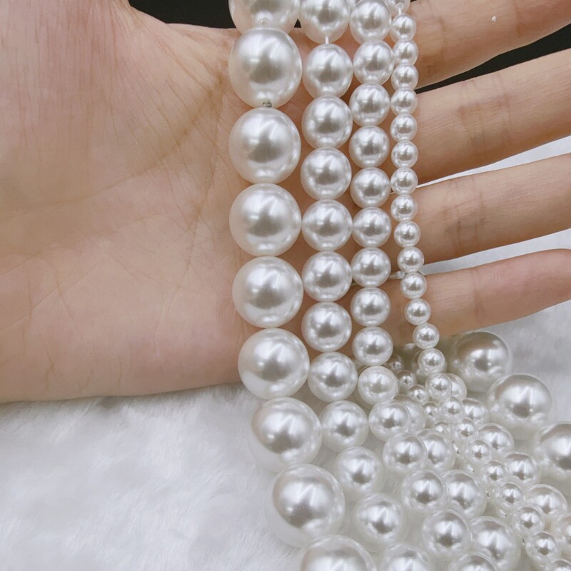 High-Quality Swarovski-Style White Pearl Beads with Holes for DIY Handmade Jewelry, Wholesale Imitation Pearls in Various Sizes High-Quality Swarovski-Style White Pearl Beads with Holes for DIY Handmade Jewelry, Wholesale Imitation Pearls in Various Sizes