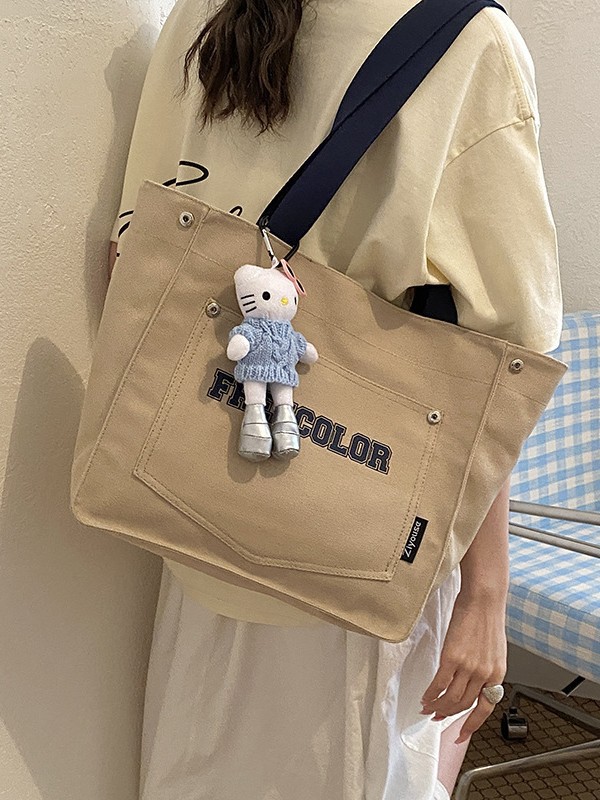 Bolso de lona para mujeres 2026 nuevo bolso de mano casual fuerte de gran capacidad textura alta bolso de viaje coreano