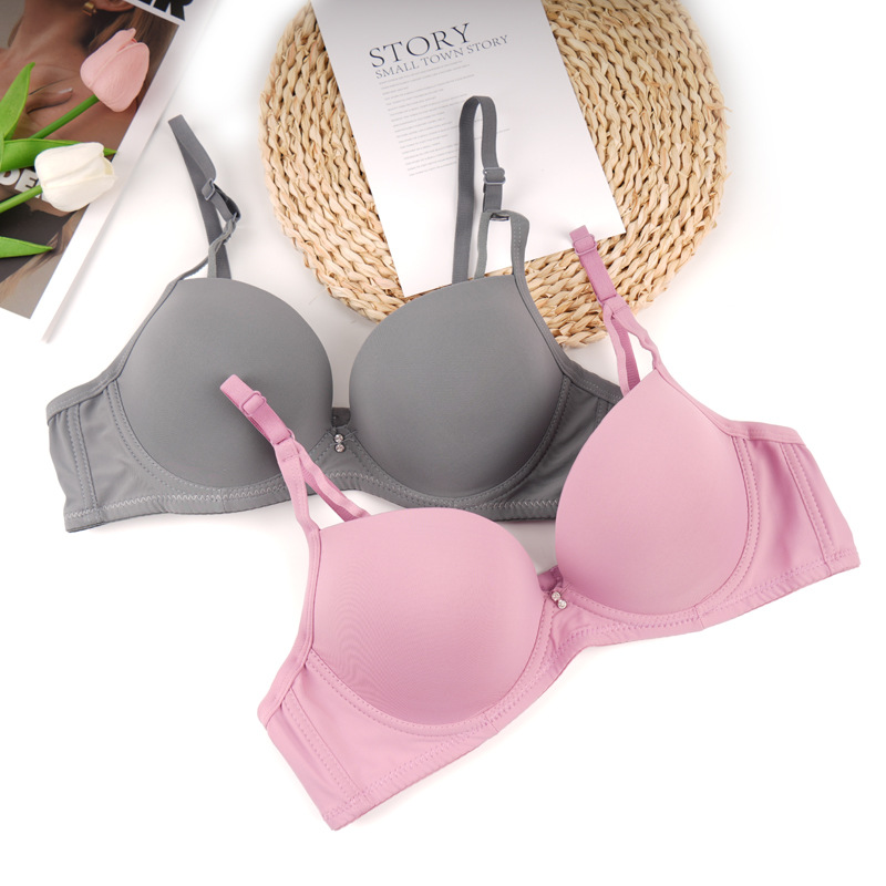 Fábrica de stock de ropa interior lisa sin marcas de pecho pequeño damas juntas sujetador de ajuste de soporte de la niñez sujetador del sudeste asiático