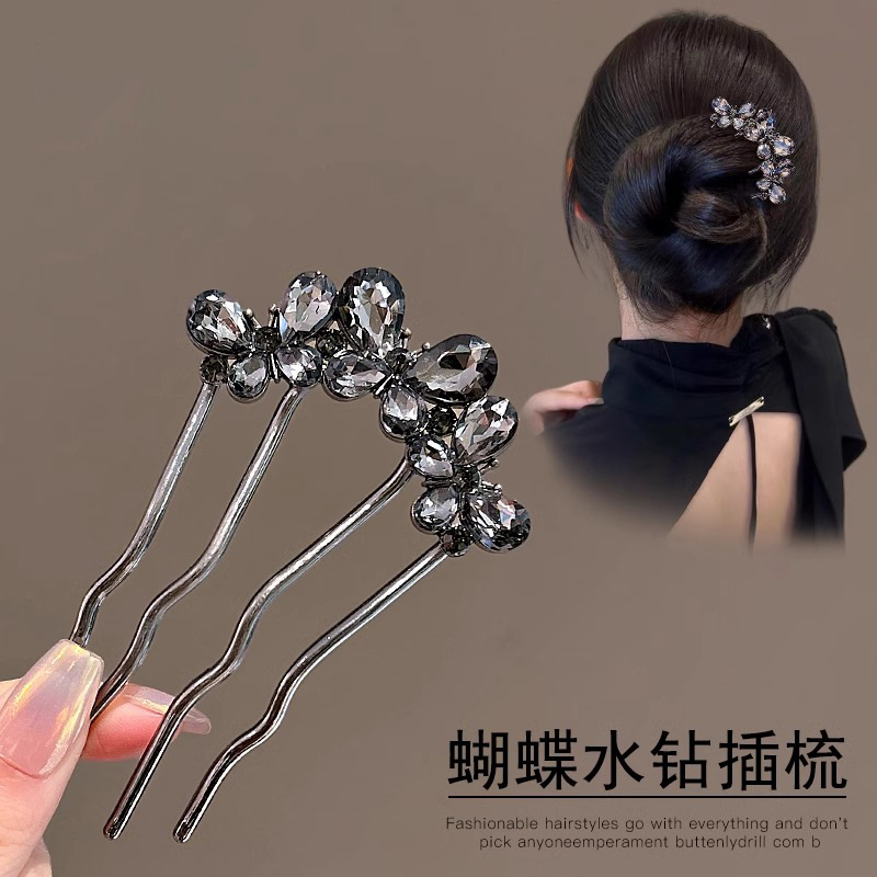 Un alto nivel de sensación de lujo ligero diamante mariposa peine de cabello tipo U de cuatro dientes enchufado peine de cabello temperamento bola de cabeza broca de cabello artefacto mágico