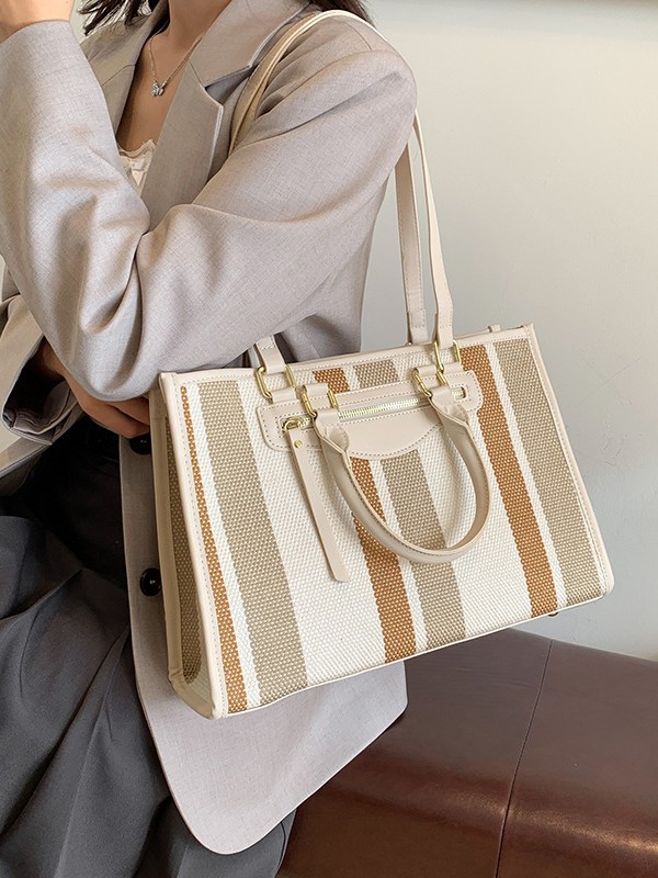 Cross-border color contrastante estriado bolso de mano casual para mujeres 2024 Amazon nueva moda de gran capacidad mochila de viaje
