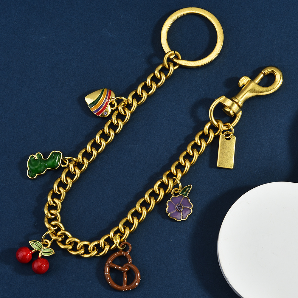 Nuevo estilo transfronterizo europeo y americano venta caliente dinosaurio amor concha cereza herradura fresa manzana bolso de cadena colgante bolso de mensajero mujer