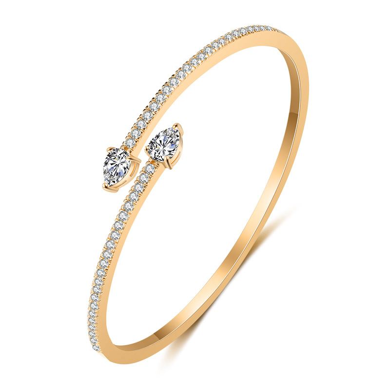 Golden bracelet drop-shaped, diamond encrusted