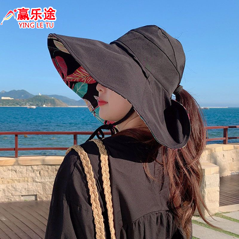 夏のファッションに合わせて、海辺のひさしの日よけの空の帽子の両面のプリントは紫外線を防ぎます。