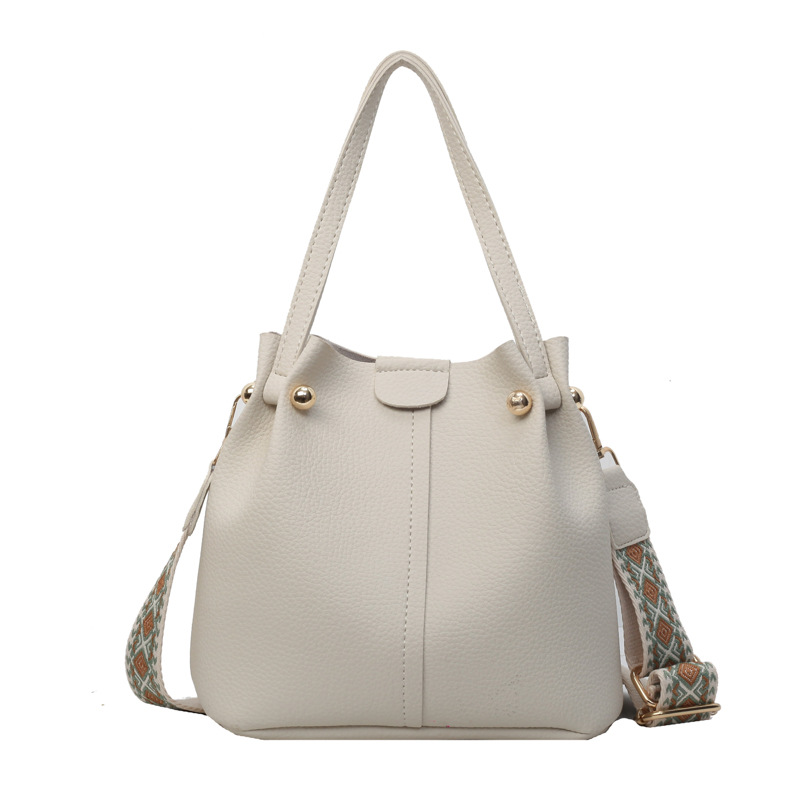 Mayorista retro bolso de cubo portátil para mujeres ventas calientes nuevo retro gran capacidad bolso de hombro simple mochila de viaje