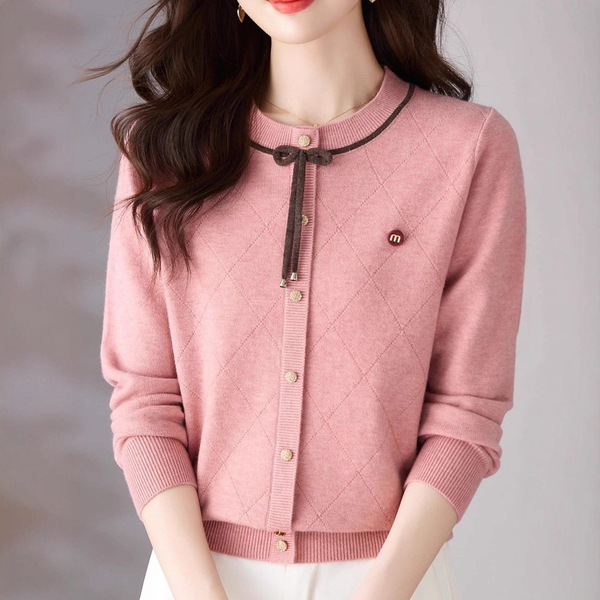 Autumn knitted cardigan with a round collar