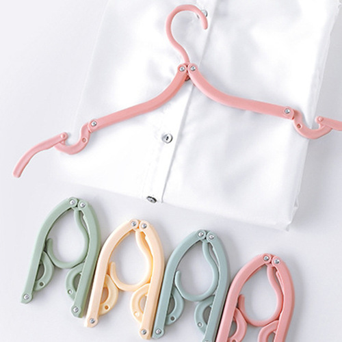 Wholesale 8 folding clothes hangers for adults and children, portable multi-functional home traceless anti-slip clothes plastic hangers
