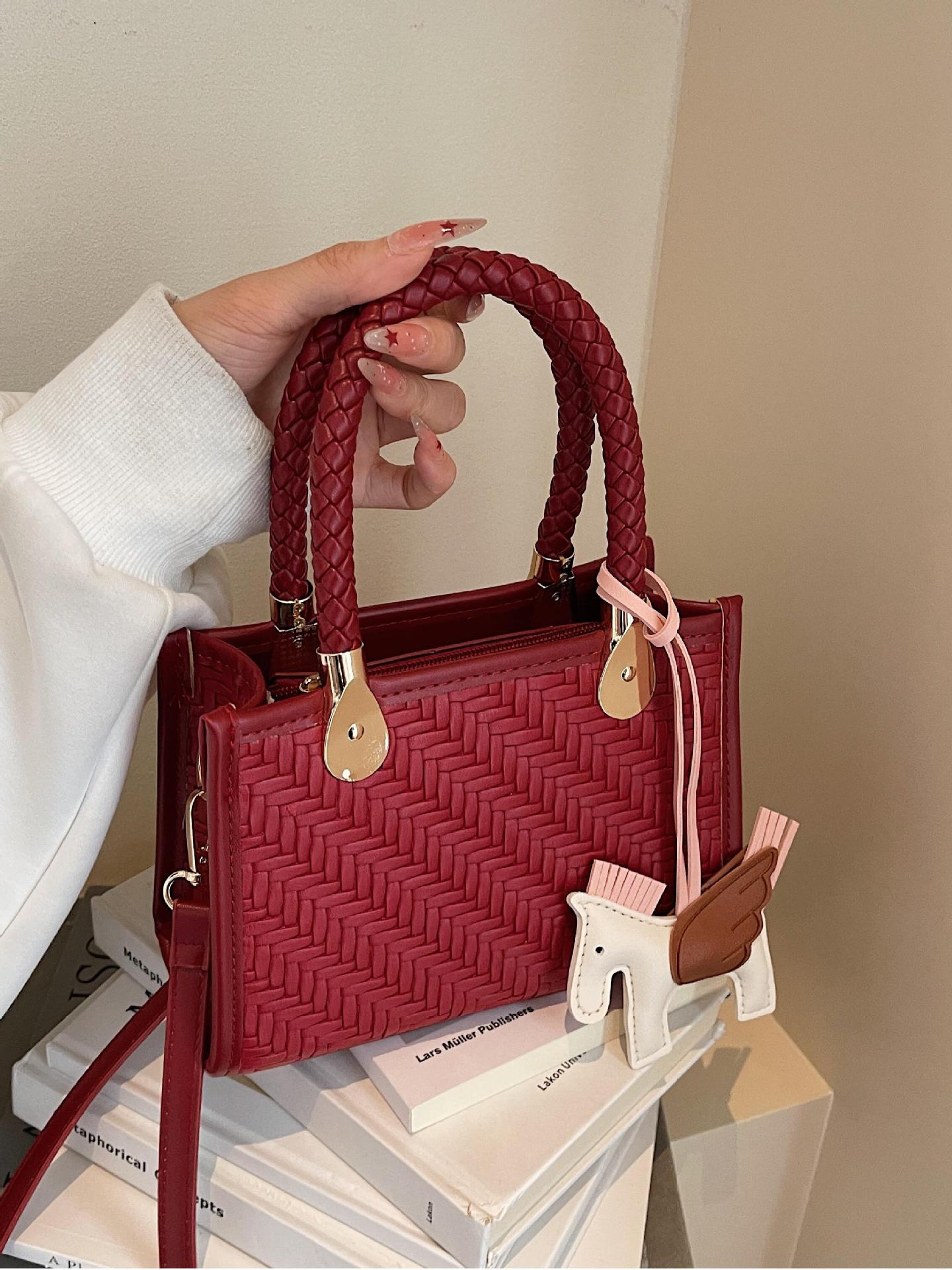 Bolso tejido más vendido de comercio exterior para mujer 2025 nuevo bolso de hombro de moda de color en contraste textura bolso cuadrado pequeño de mensajero de todo fósforo