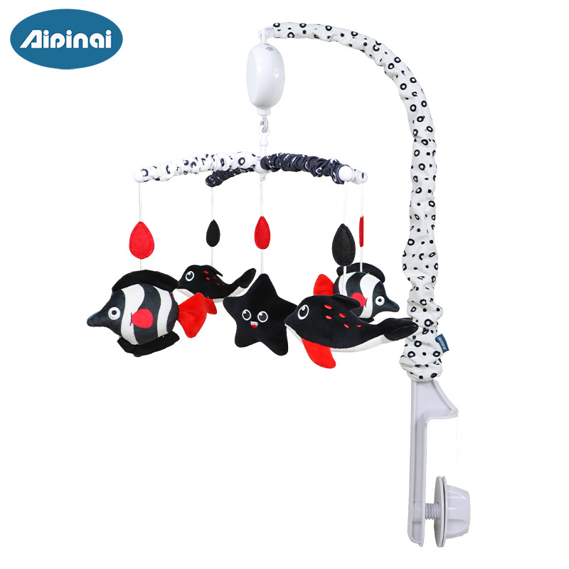 Nueva cama giratoria de música para niños Bell bebé anti-estrabismos cama colgante de juguete negro y rojo bebé felpa campana de noche al por mayor