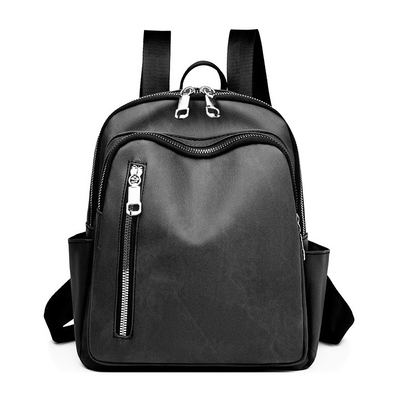 Mochila de todo fósforo de color puro para mujer 2024 nuevo estilo de cuero suave moda mochila de gran capacidad bolsa de viaje al por mayor