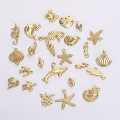 合金製ジュエリーアクセサリー 海洋生物 ヒトデ 貝殻 巻貝 クジラ マットゴールド 小さなペンダント卸売