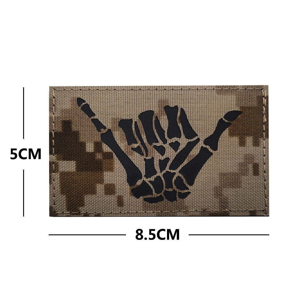 Taiyi copyright suministro en stock Ray cráneo dedo derecho gesto 666IR identificación capítulo velcro luminoso insignia