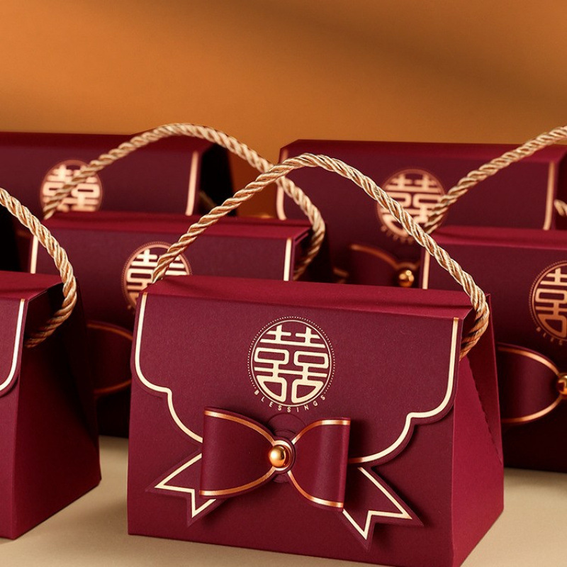 Caja de dulces de boda Boda 2024 Nuevo caramelo portátil de alta gama Empaquetado de dulces de boda Caja de regalo Bolsa vacía