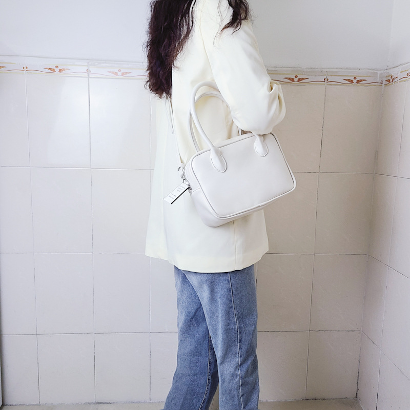 Design di nicchia coreano con la stessa borsa color crema e una borsa elegante, borsa quadrata con croce diagonale a spalla singola_voghion.com