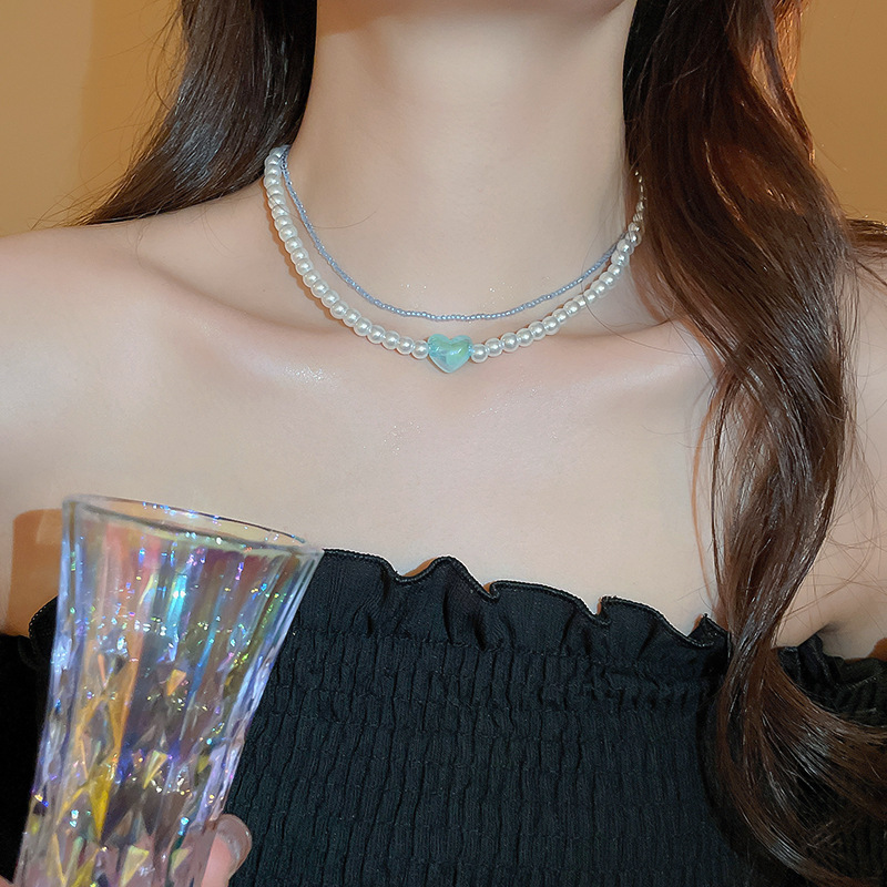 Collar de perlas con lazo de flor con cuentas francesas Elegante cadena de clavícula con sentido de alta gama retro ligero decoración de lujo femenino