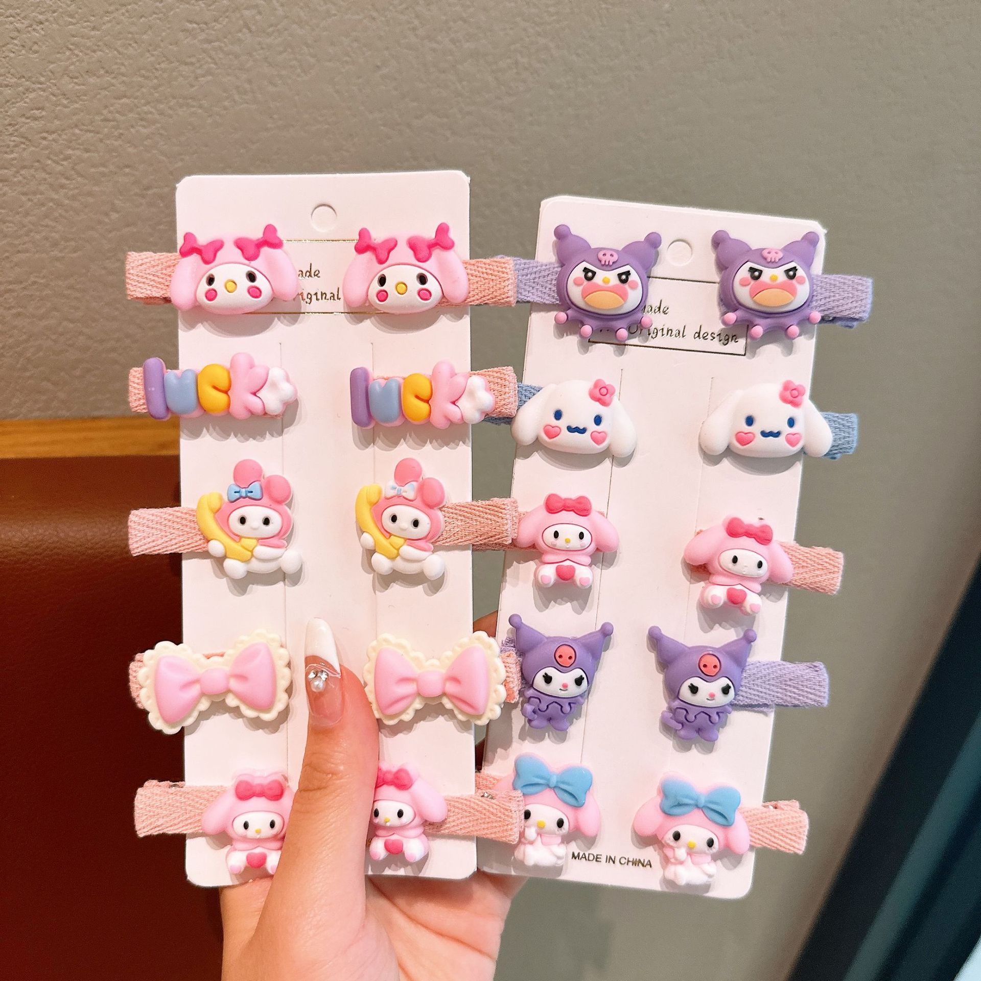 Tombro de bebé femenino Dibujos animados tela todo incluido horquilla para niños 2024 nuevo conjunto de horquillas de gaviota Sanli accesorios para el cabello