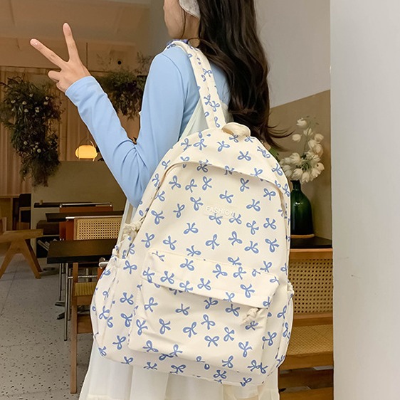 女款背包蝴蝶结背包大容量背包可爱背包学生书包休闲背包女童背包