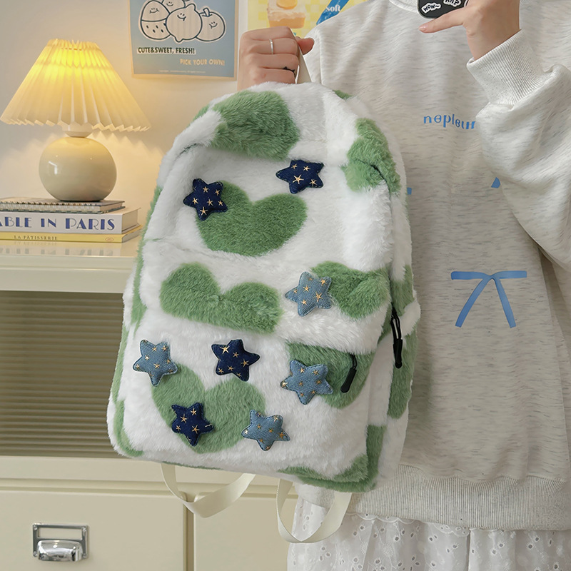 La versión coreana de la mochila de peluche es una mochila de doble hombro, el diseño de nicho japonés de la mochila de alto valor facial, la mochila de clase de las estudiantes universitarias.