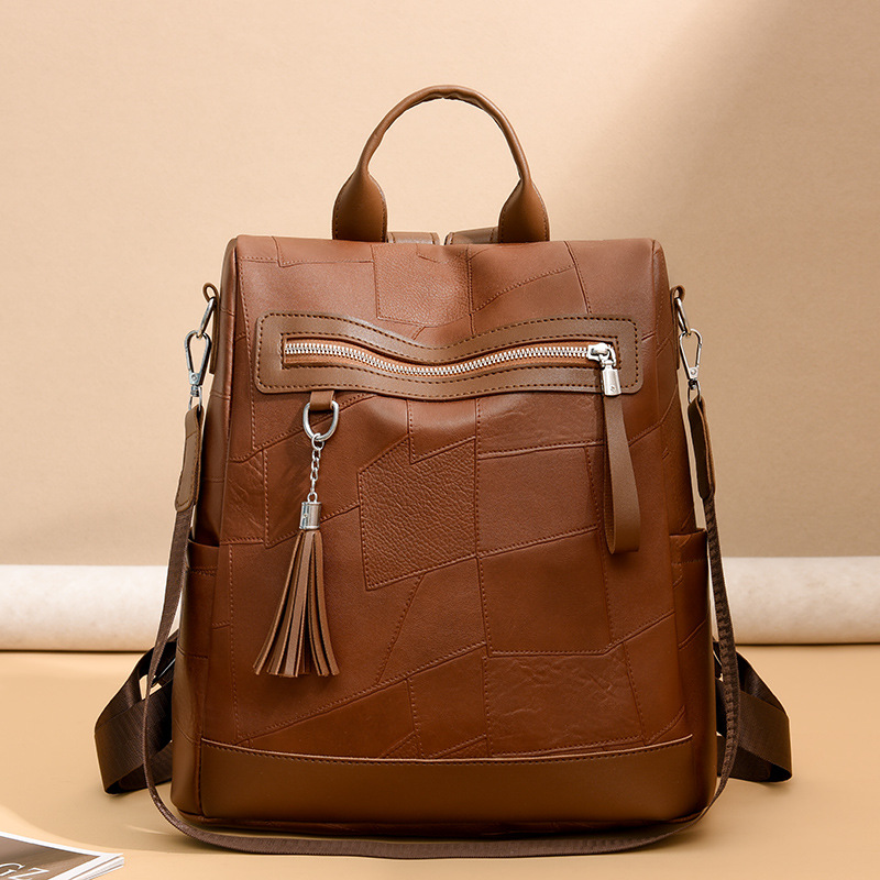 Mochila retro de cuero suave de costura para mujer AliExpress Tendencia de moda de gran capacidad Mochila coreana para estudiantes universitarios de cercanías