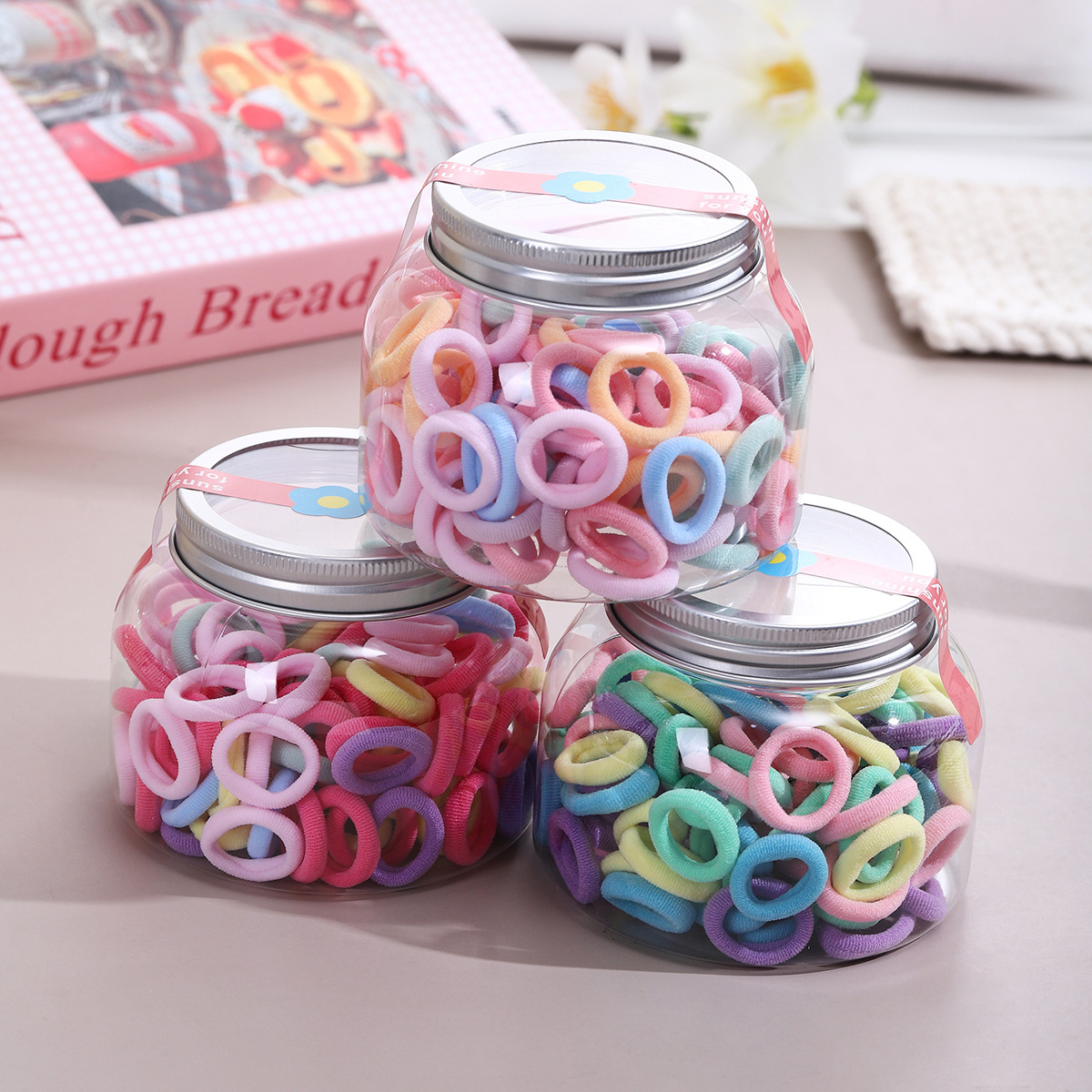 Los anillos para el cabello de los niños no dañan el cabello, los anillos de toalla para bebés, las chicas lindas, las bandas elásticas de los pulgares de color caramelo, los sombreros de cuerda para atar el cabello