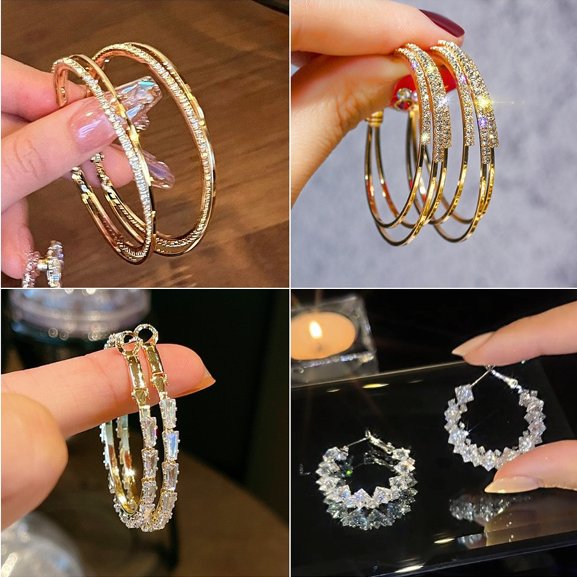 Small design fashionable earrings with zircon