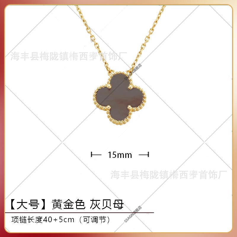Large four-leaf clover necklace gold gray mother-of-pearl
