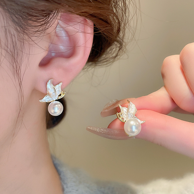 Pendientes de perlas con borla de flores de alta calidad con aguja de plata Pendientes de todo fósforo de moda francesa de nuevo estilo Pendientes de alta calidad de lujo ligero