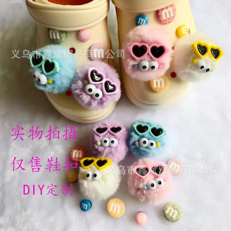 Muñeca de dibujos animados felpa estrella Delu agujero zapatos accesorios piel bola creativa nuevos zapatos decorativos hebilla agujero zapatos Accesorios